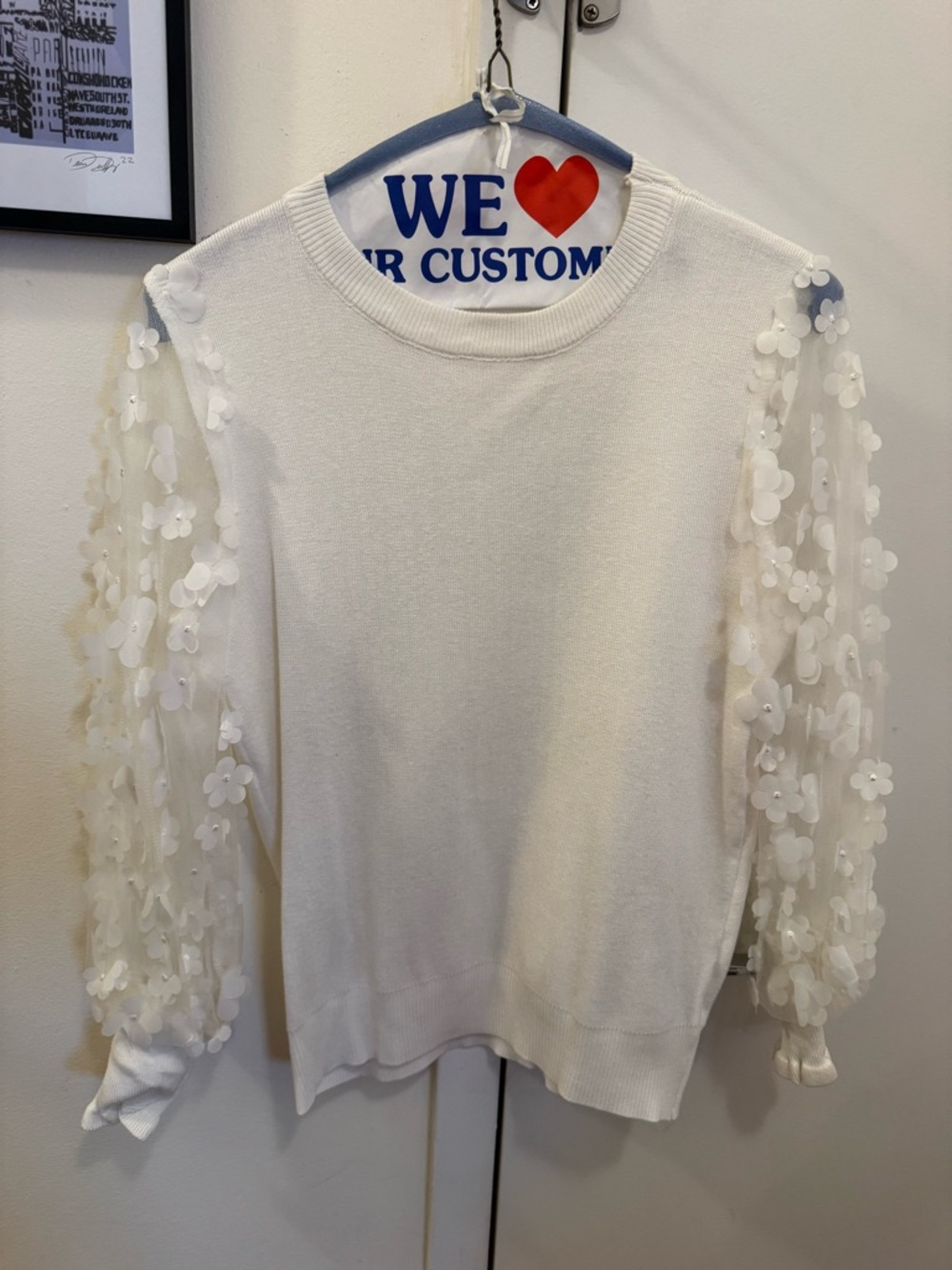 Chicwish White Crewneck Sweater with Floral Appliqué Sheer Sleeves